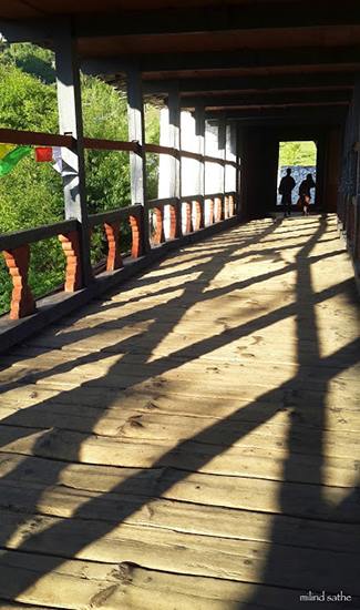 Shadows on the cantilever bridge, Paro Dzong