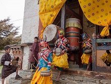 Artistes step out in the monastery courtyard for a dance ritual