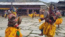 Masked Dancers at Ura village festival near Bumthang, Bhutan