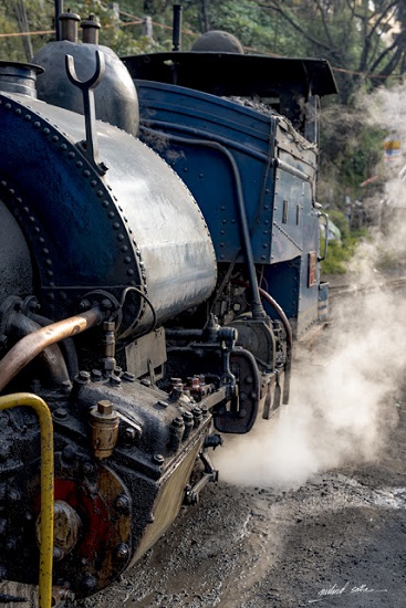 Steam locomotive of Darjeeling Himalayan Railway puffing its way