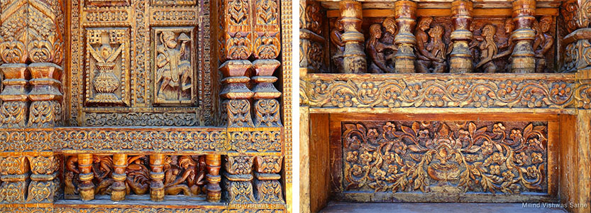 Intricate wood carving on the temple wall panels